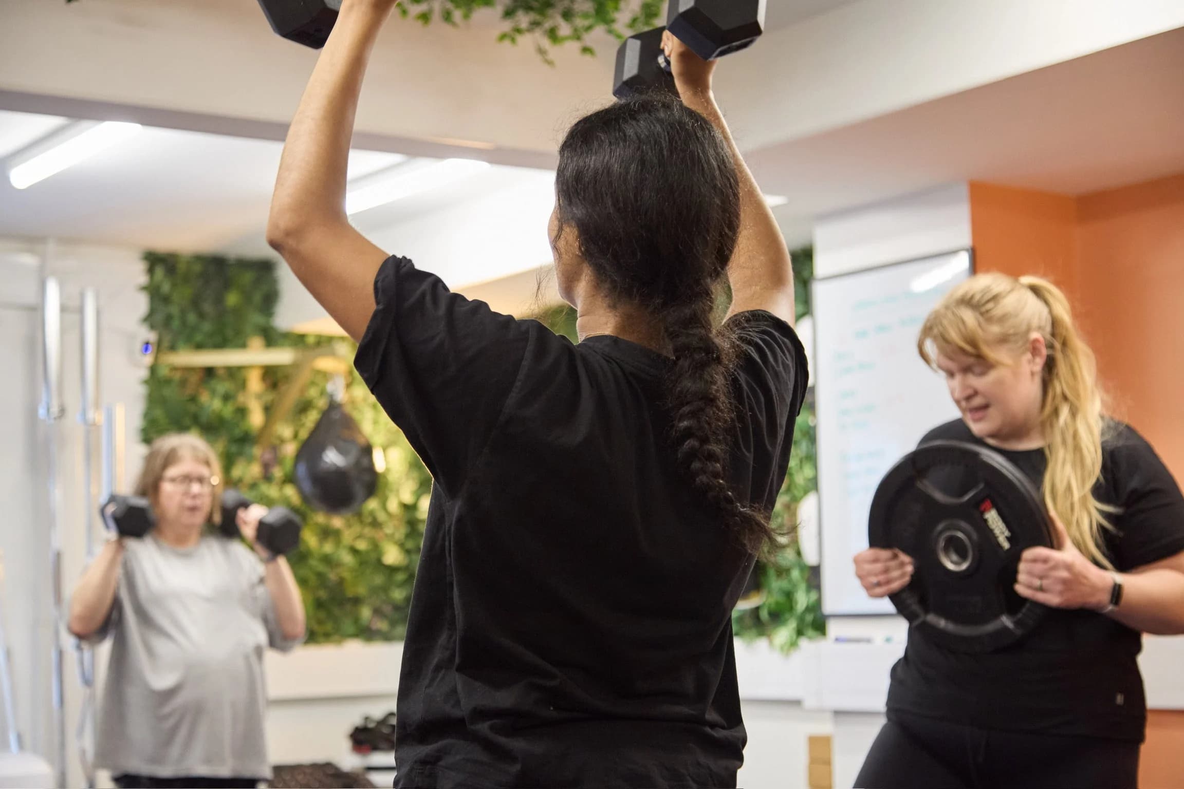 Group strength session at AW Wellness Studios